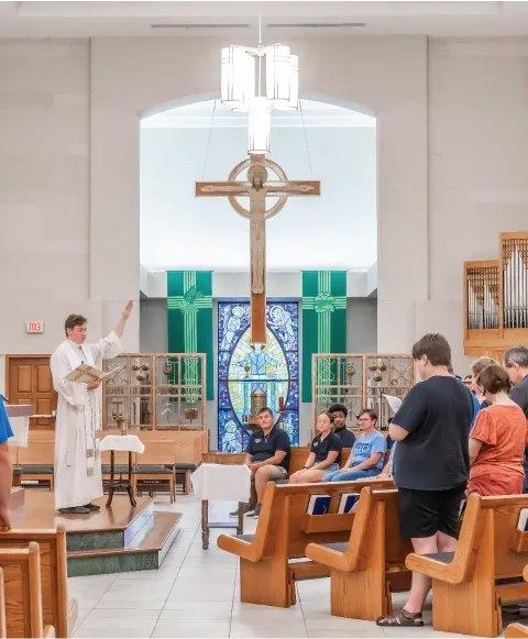 Priest presiding over Catholic Mass.